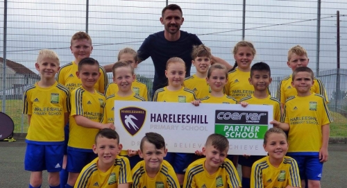 Euro 2016 scorer and Premiership footballer Gareth McAuley launches the first ever Coerver&reg; Partner School at Hareleeshill Primary School in South Lanarkshire